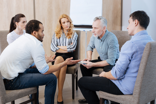 Pleasant nice people having a group discussion